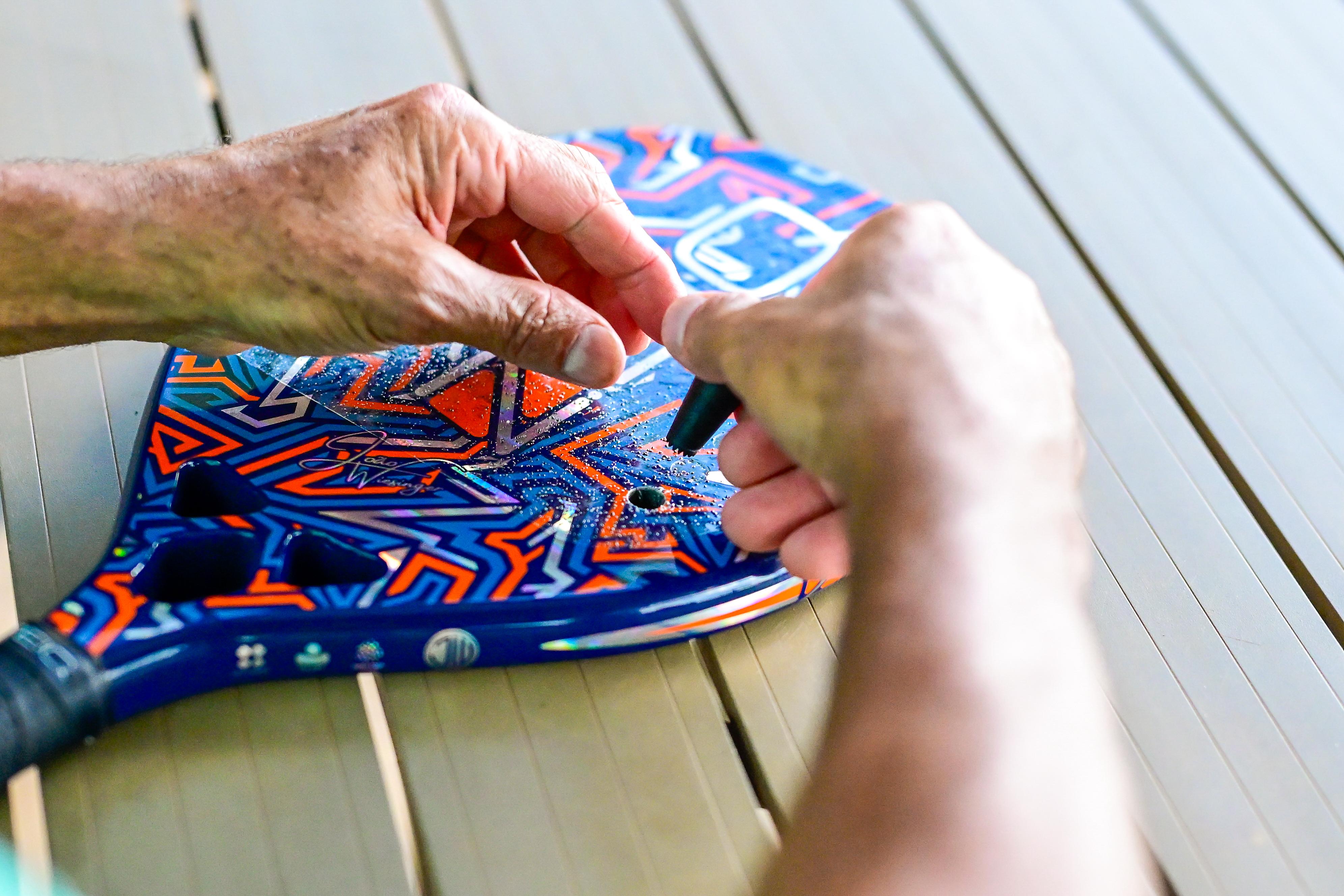 Raquete manutenção close detalhe #1